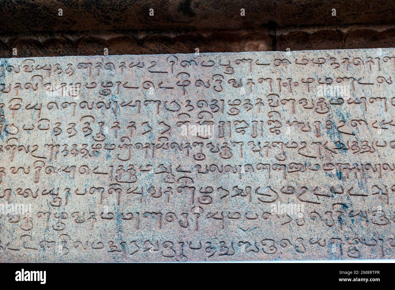 Tamil and Sanskrit inscriptions on the 11th century temple Stock Photo