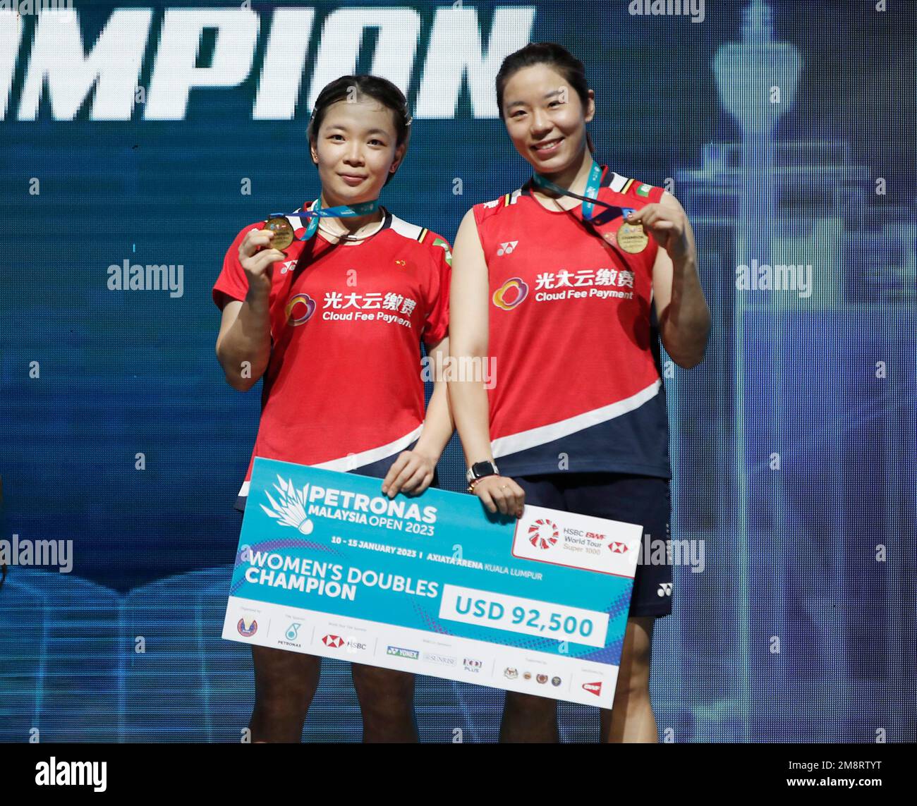 Chen Qing Chen (L) and Jia Yi Fan of China pose for photo with their medals at the medal ceremony for the Women Doubles Finals match of the Petronas Malaysia Open 2023