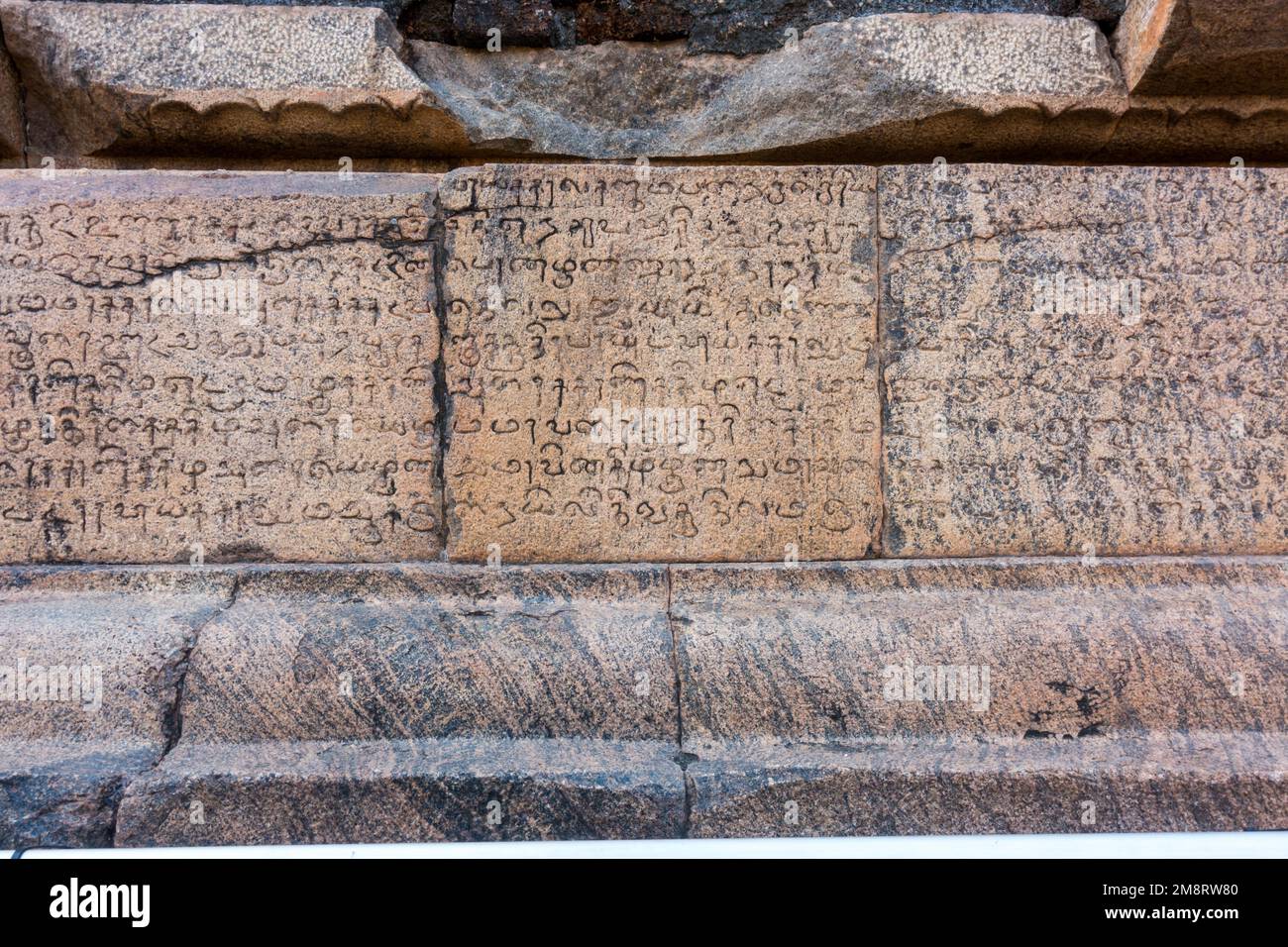 Tamil and Sanskrit inscriptions on the 11th century temple Stock Photo