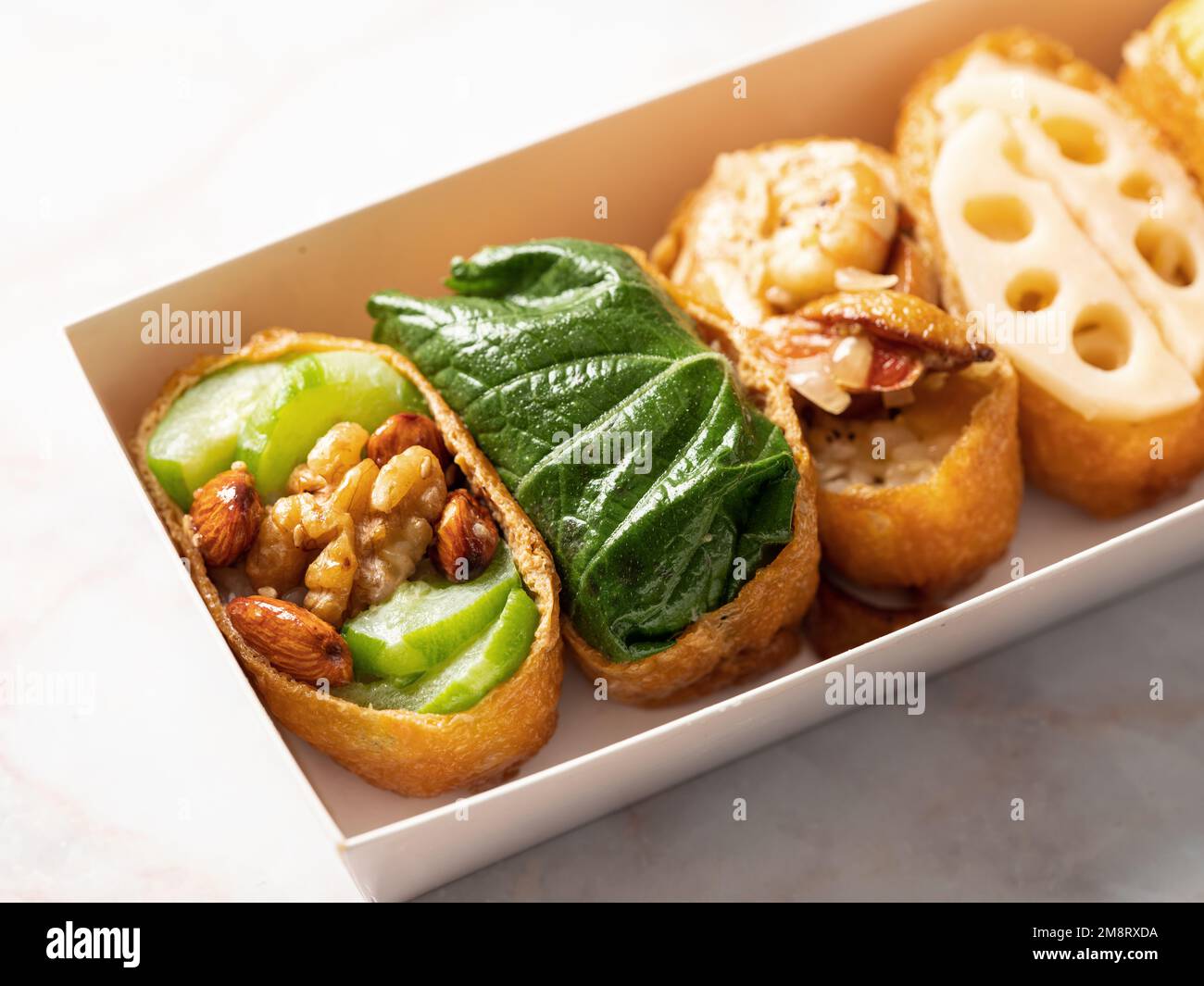 Fried Tofu Rice Balls topped with various vegetables Stock Photo - Alamy