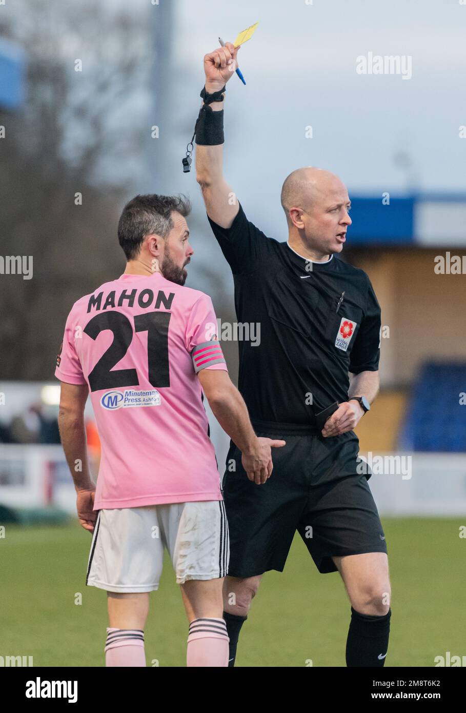 Chester, Cheshire, England. 14th January 2023. Former Chester player and Curzon Ashton’s captain Craig Mahon receives booking from referee Richard Aspinall, during Chester Football Club V Curzon Ashton at the Deva Stadium, in the National League North (Credit Image: ©Cody Froggatt) Stock Photo