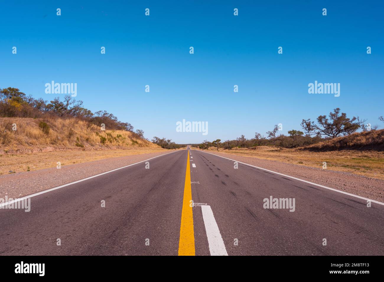 An empty highway leading to the Santiago del Estero, Argentina Stock Photo