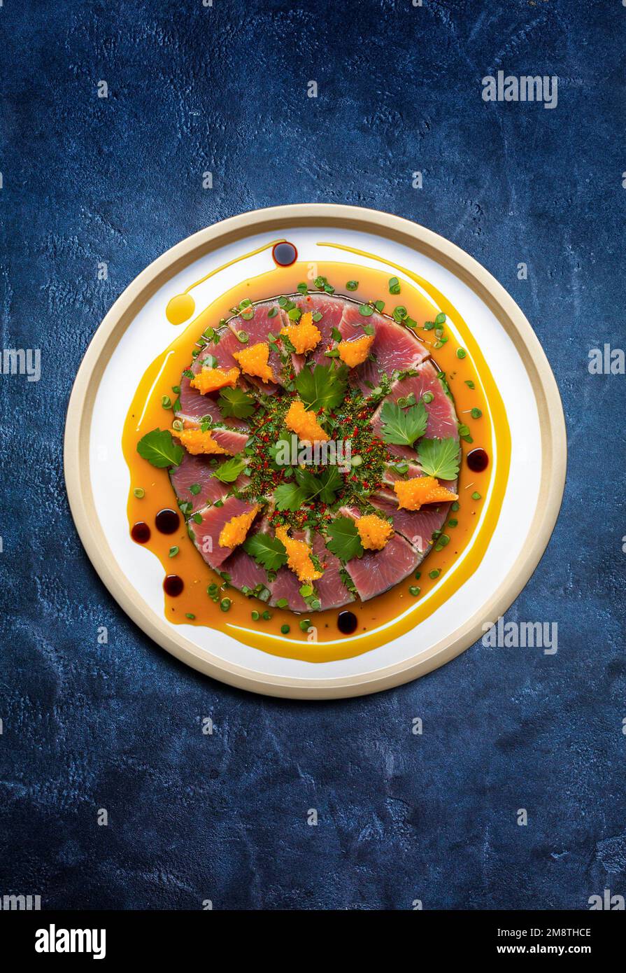 A plate of Marinated Tuna steak sliced. Stock Photo