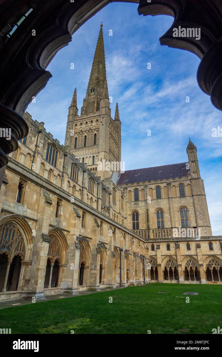 Norwich Cathedral Spire and south transept of Norwich Cathedral viewed from the cloisters Stock Photo