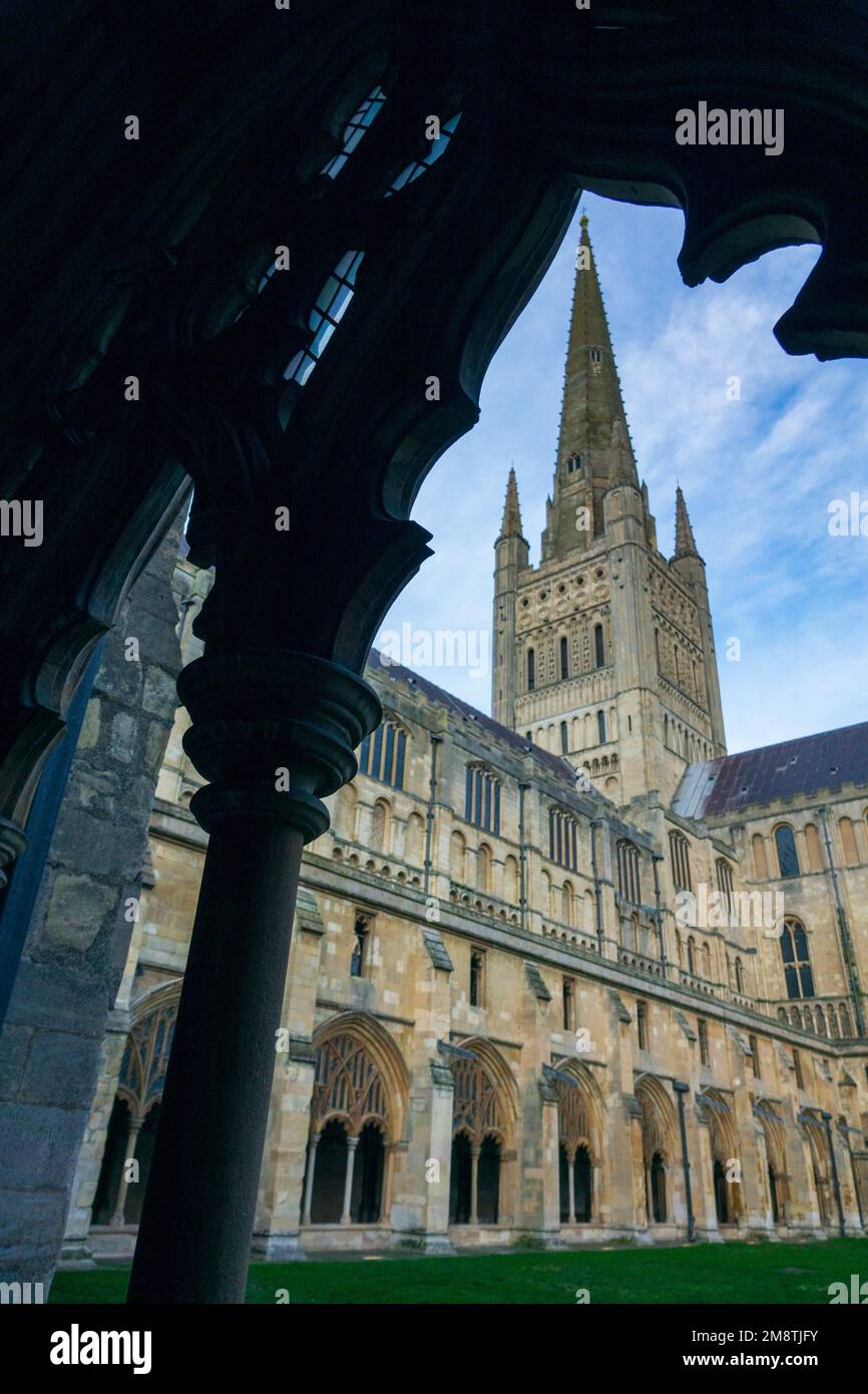 Norwich Cathedral Spire and south transept of Norwich Cathedral viewed from the cloisters Stock Photo