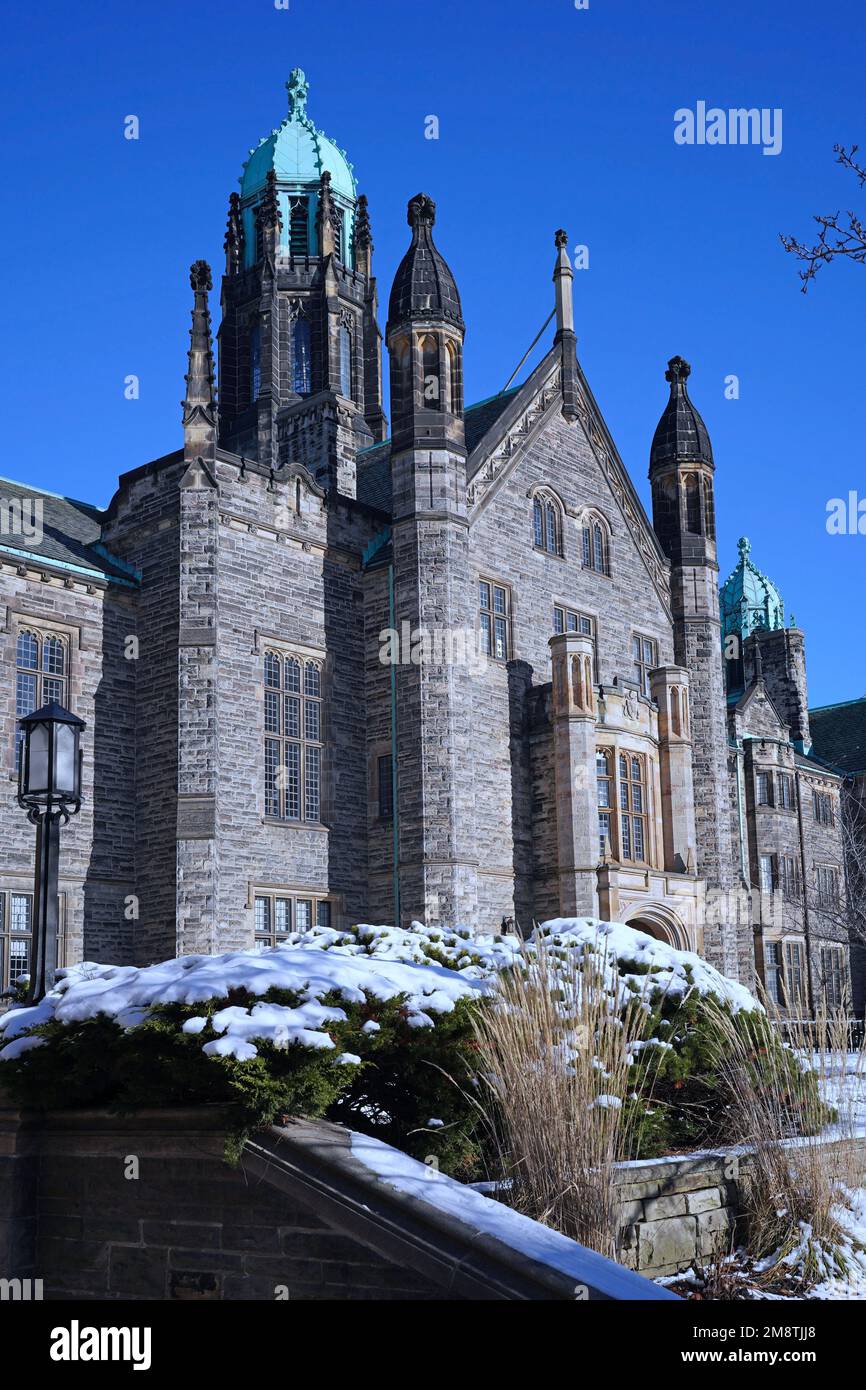 Toronto, Canada - January 15, 2022:  University of Toronto campus in winter, showing the front of gothic style Trinity College Stock Photo