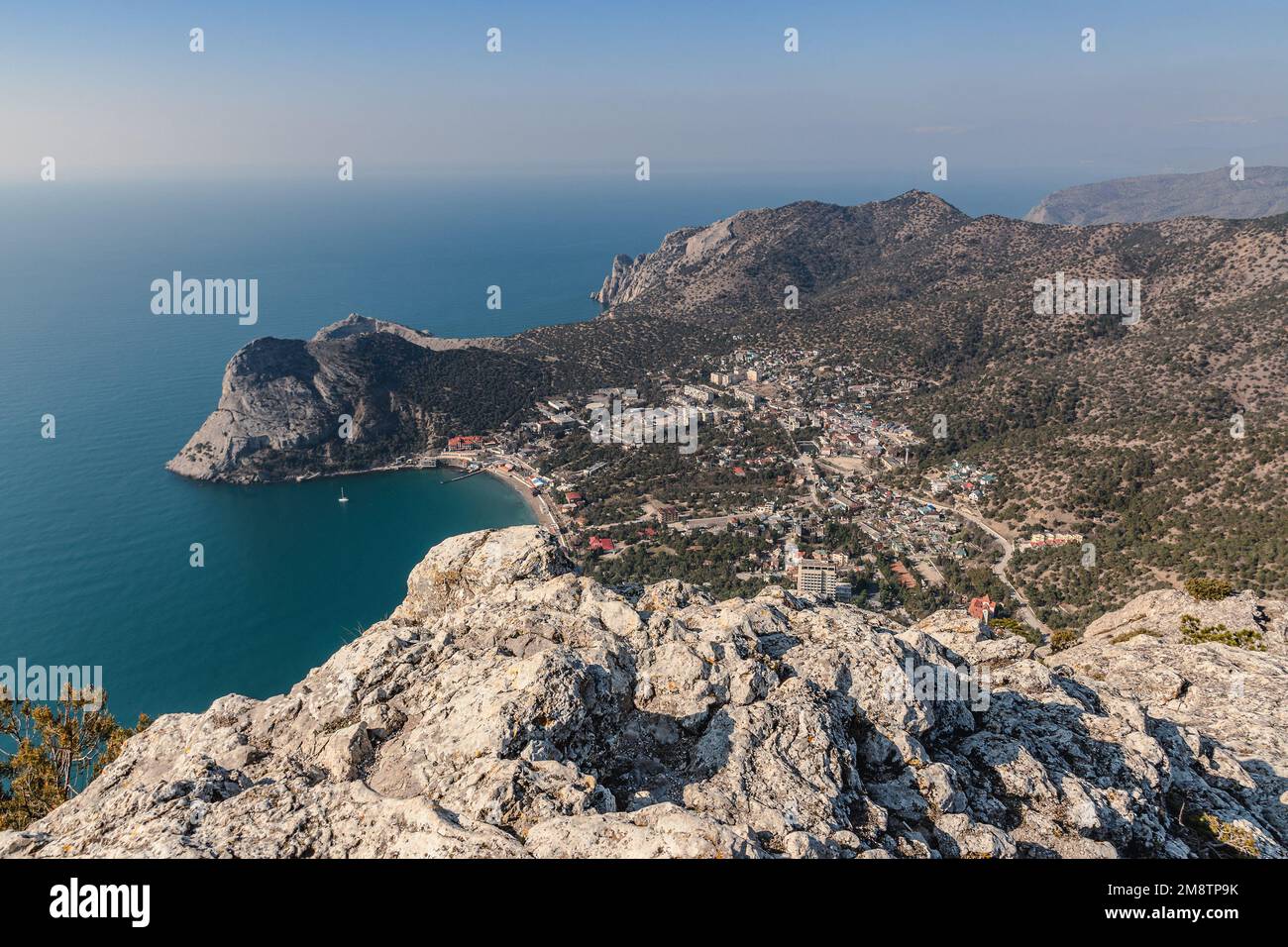 View of the resort city Novyi Svet and Green bay from the top of Sokol Mountain in spring. Crimea. Stock Photo