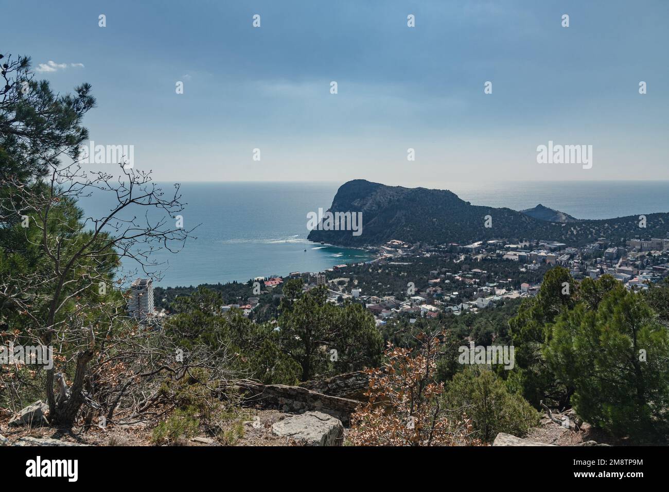 View of the resort city Novyi Svet and Green bay from trail in spring. Crimea. Stock Photo