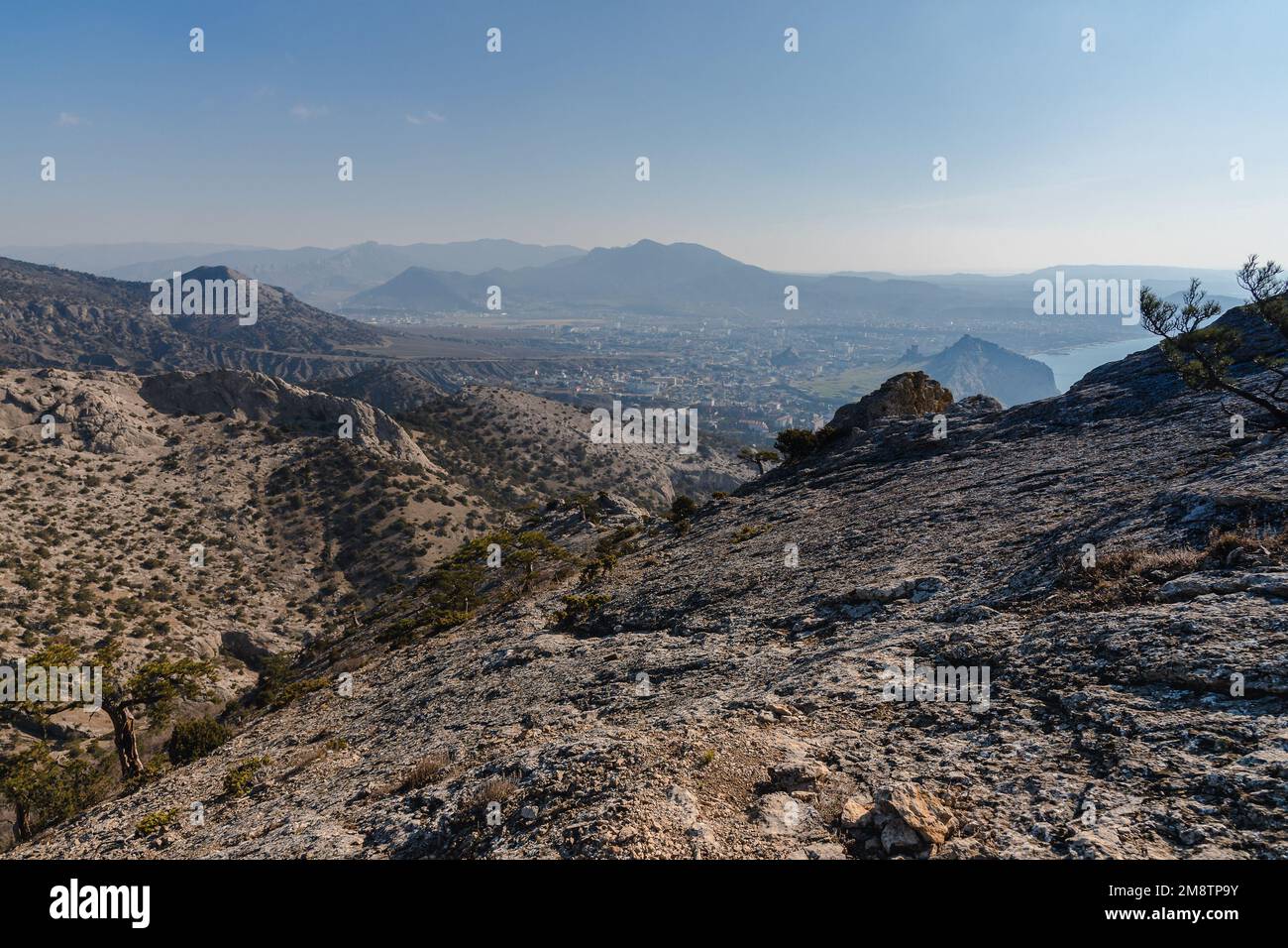 View on Sudak from of Falcon Sokol mountain at morning in spring. Crimea Stock Photo
