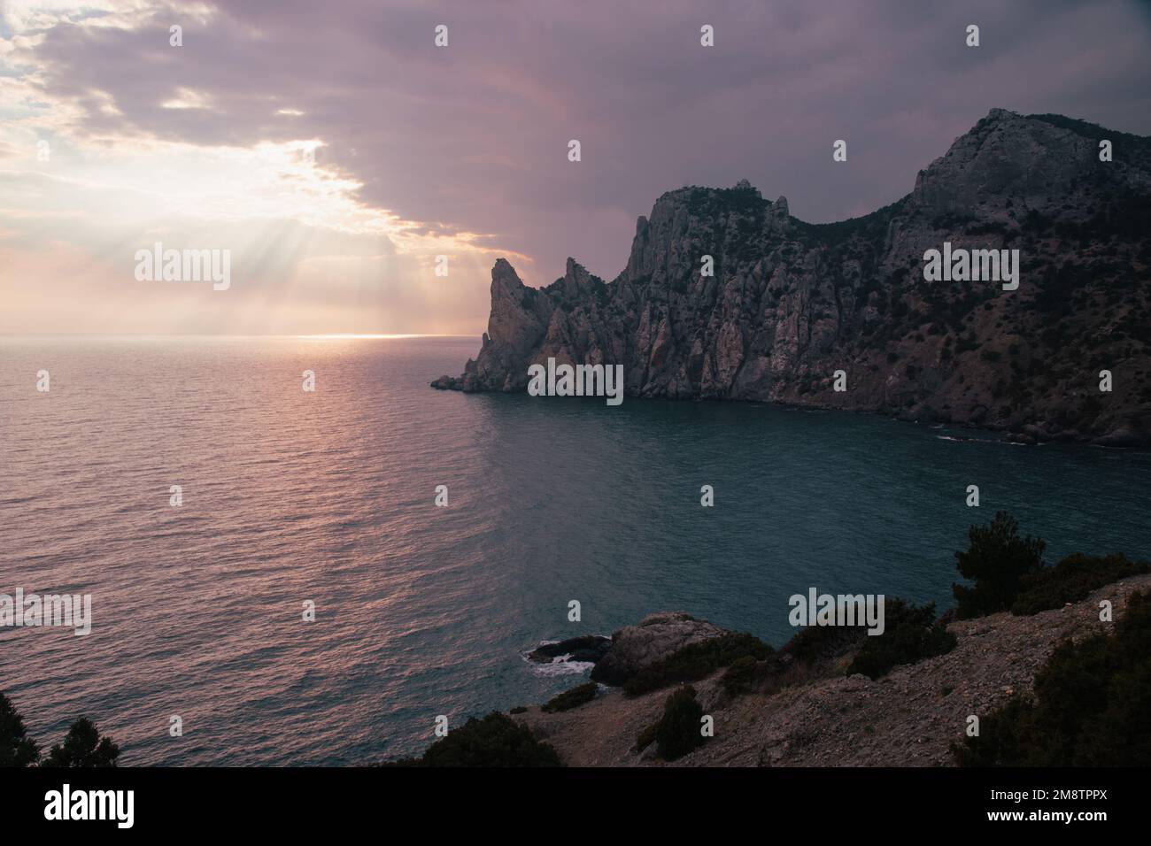 View of Karaul-Oba mountain,Cape Chicken-Kaya and Blue bay on sunset in spring. Noviy Svet. Crimea Stock Photo