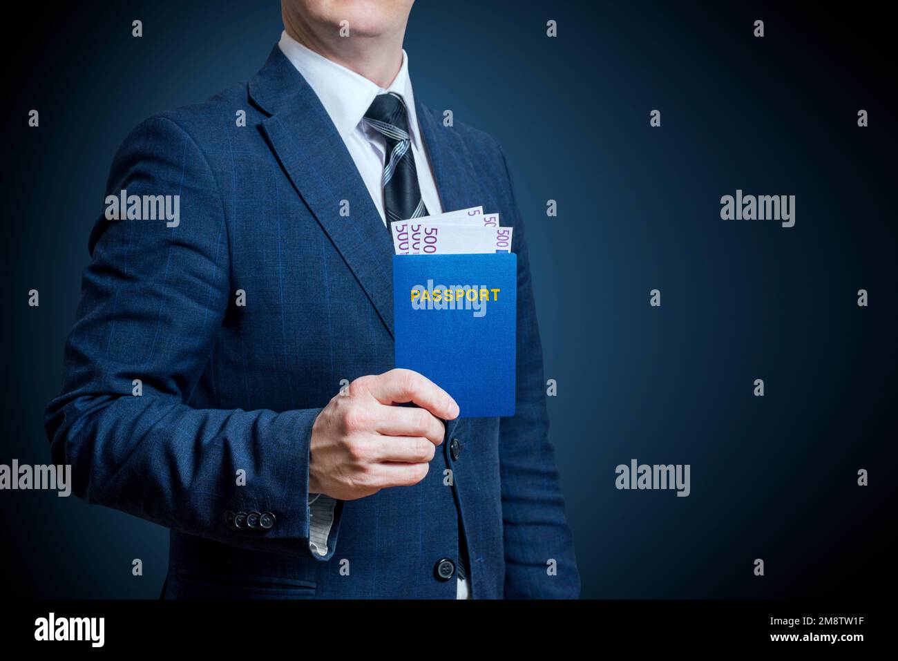 Businessman holding passport with money . Travel and Holiday concept Stock Photo