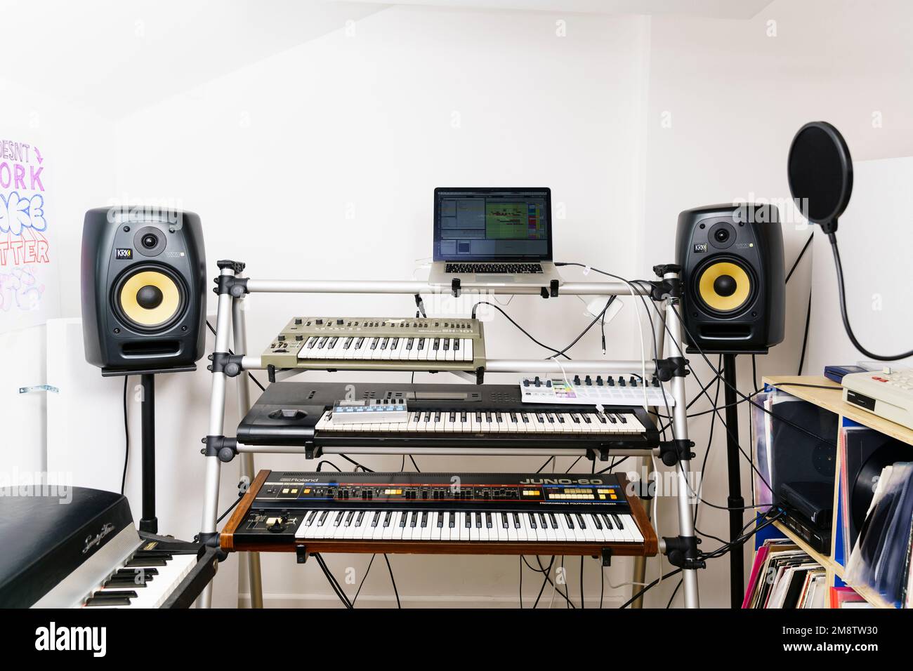 Keyboards and speakers in a music recording studio in Bruton, Somerset