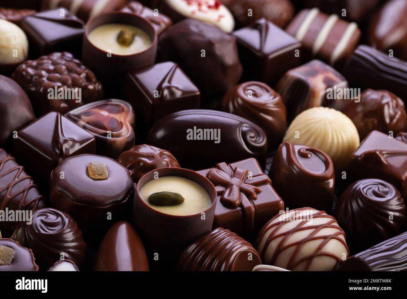 assorted chocolate candy background, sweet food, top view. Stock Photo