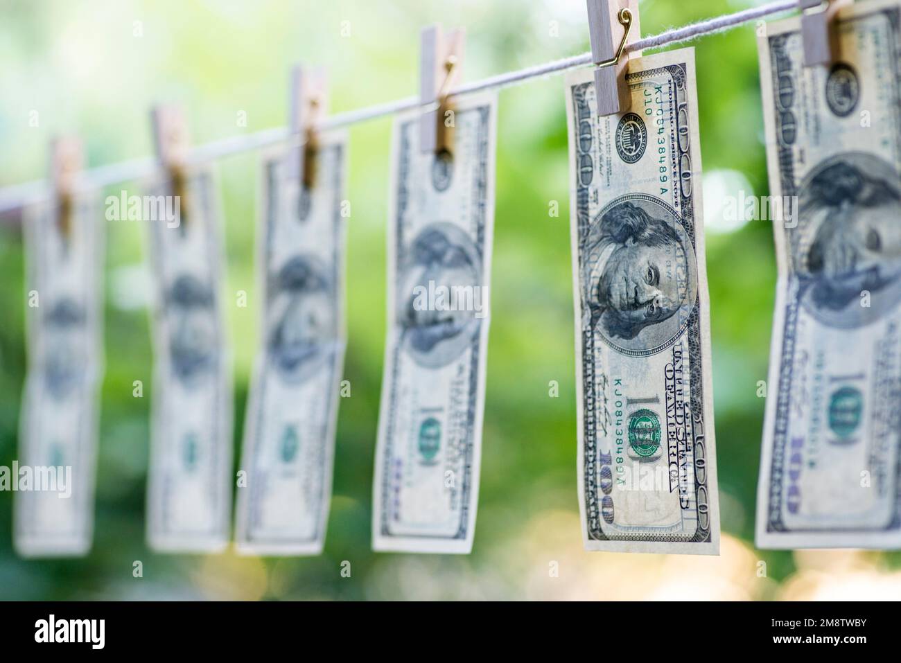 Money Laundering. Money Laundering US dollars hung out to dry Stock Photo