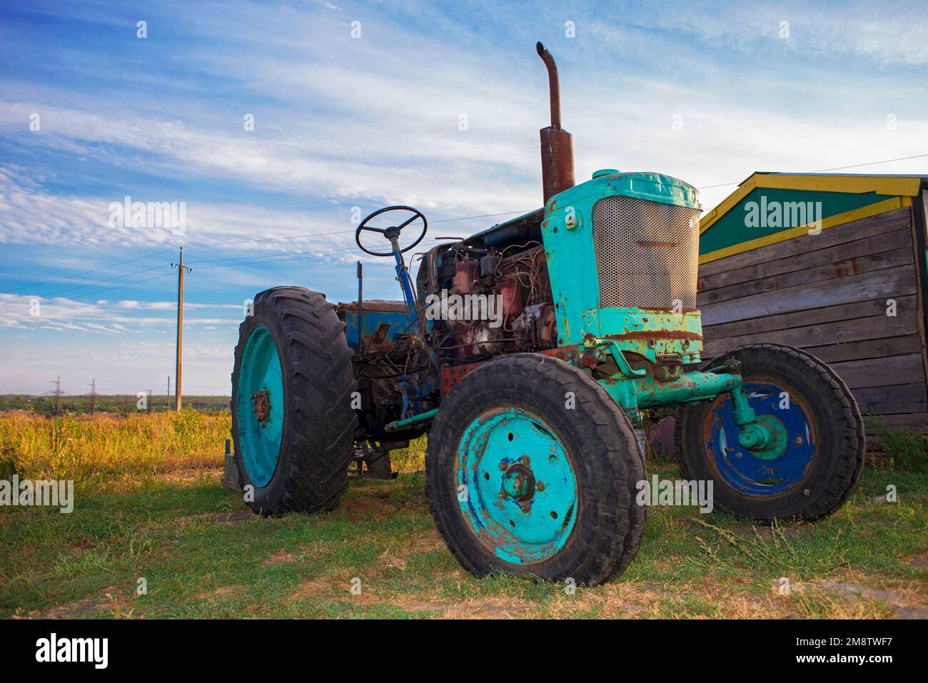 old tractor in field Stock Photo - Alamy