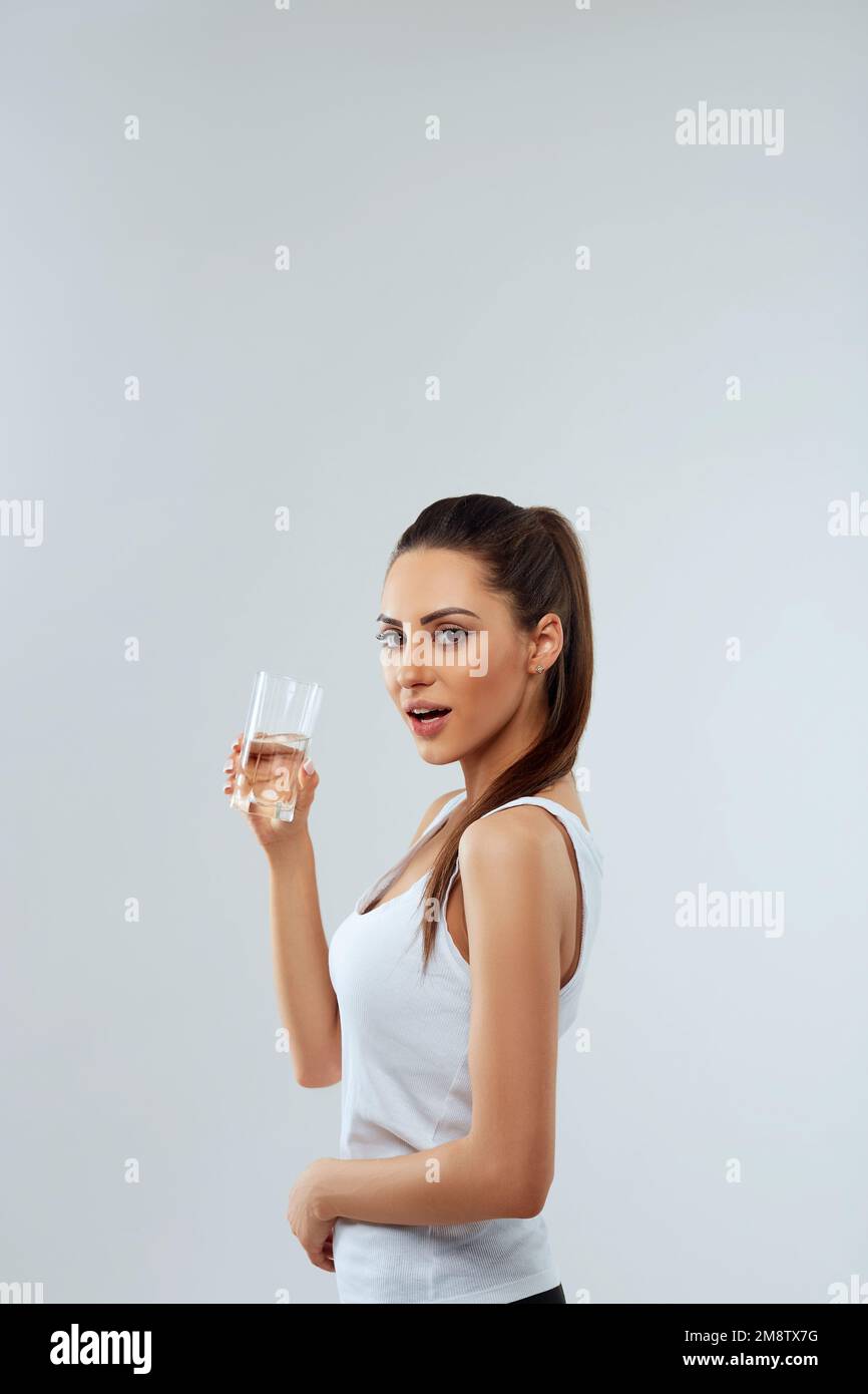 woman holding  glass of water. Drink water. Diet concept Stock Photo