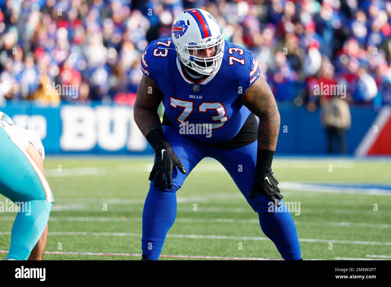 Buffalo Bills offensive tackle Dion Dawkins (73) lines-up during the first  half of an NFL wild-card playoff football game against the Miami Dolphins,  Sunday, Jan. 15, 2023, in Orchard Park, N.Y. (AP