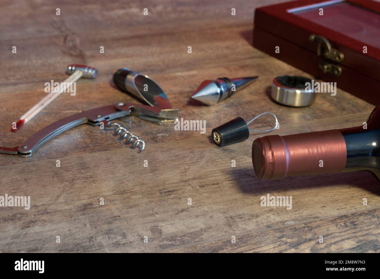 Set of accessories for bottled wine. Additional stoppers, means for