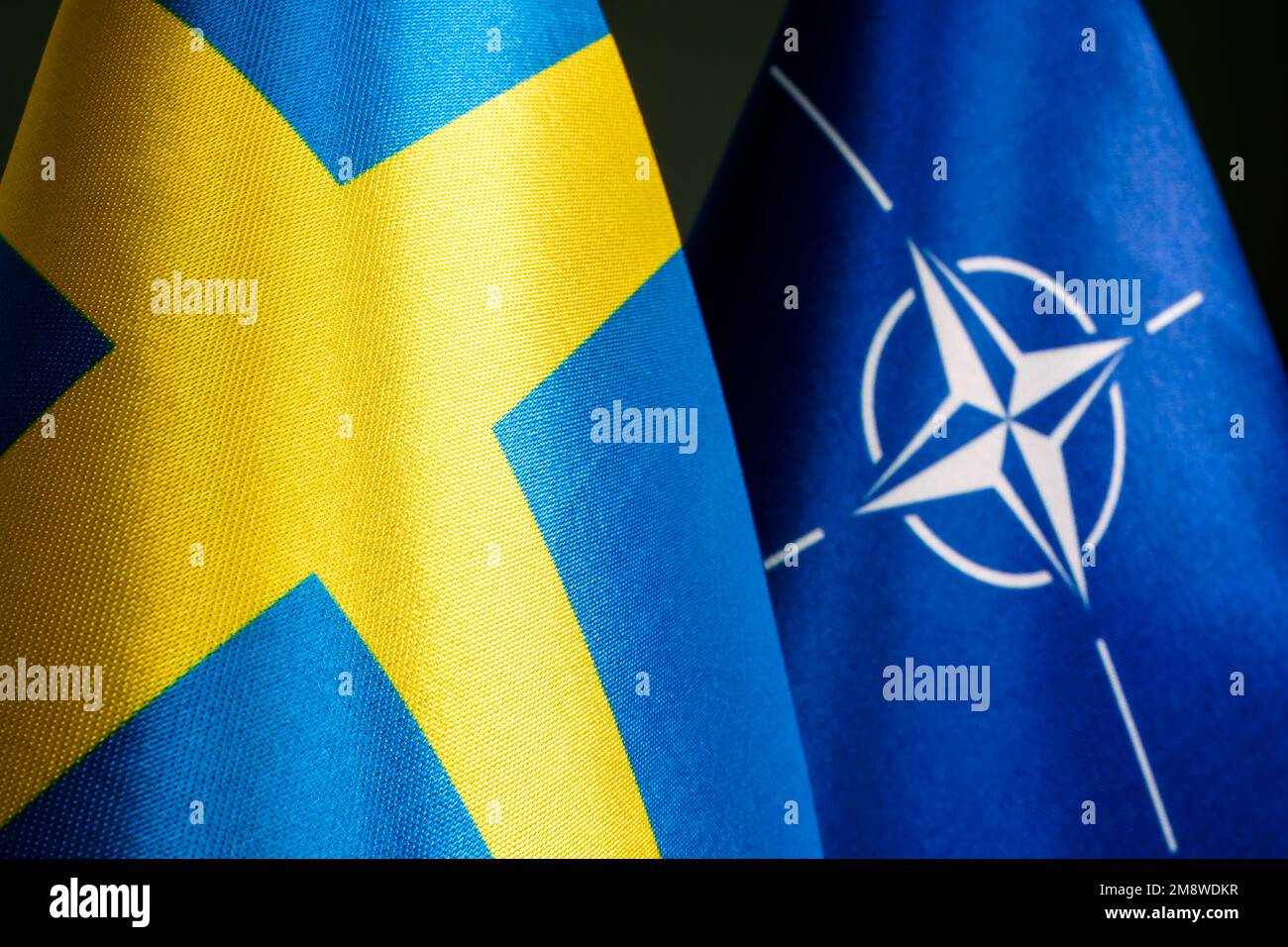 KYIV, UKRAINE - January 10, 2023. Flags of NATO and Sweden. Stock Photo