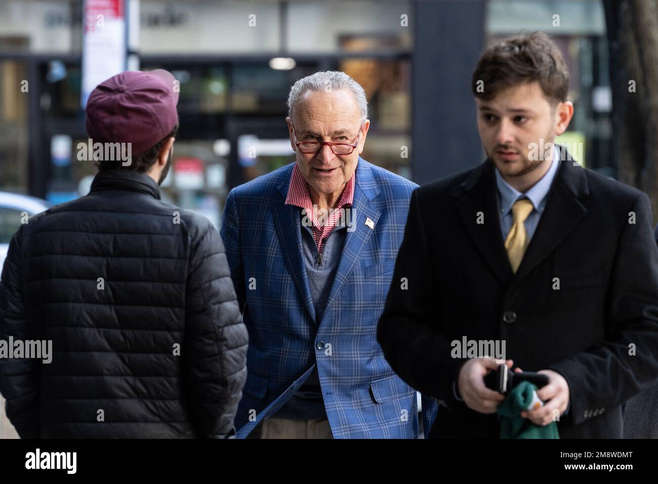 Senator Charles Schumer arrives for press briefing at lobby of 875 3rd avenue, New York on January 15, 2023 to push for confirmation of FAA Administrator choice by President Biden Stock Photo