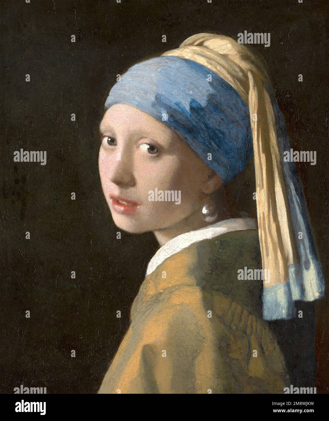 GIRL WITH A PEARL EARRING  by Johannes Vermeer (1665) Stock Photo