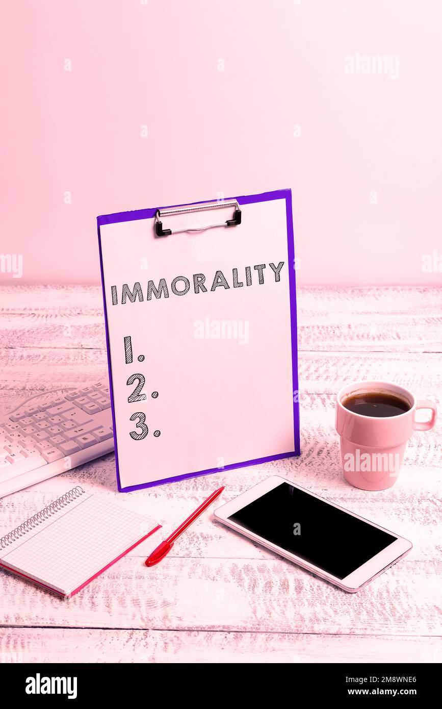 Sign displaying Immorality. Business idea the state or quality of being immoral, wickedness Stock Photo