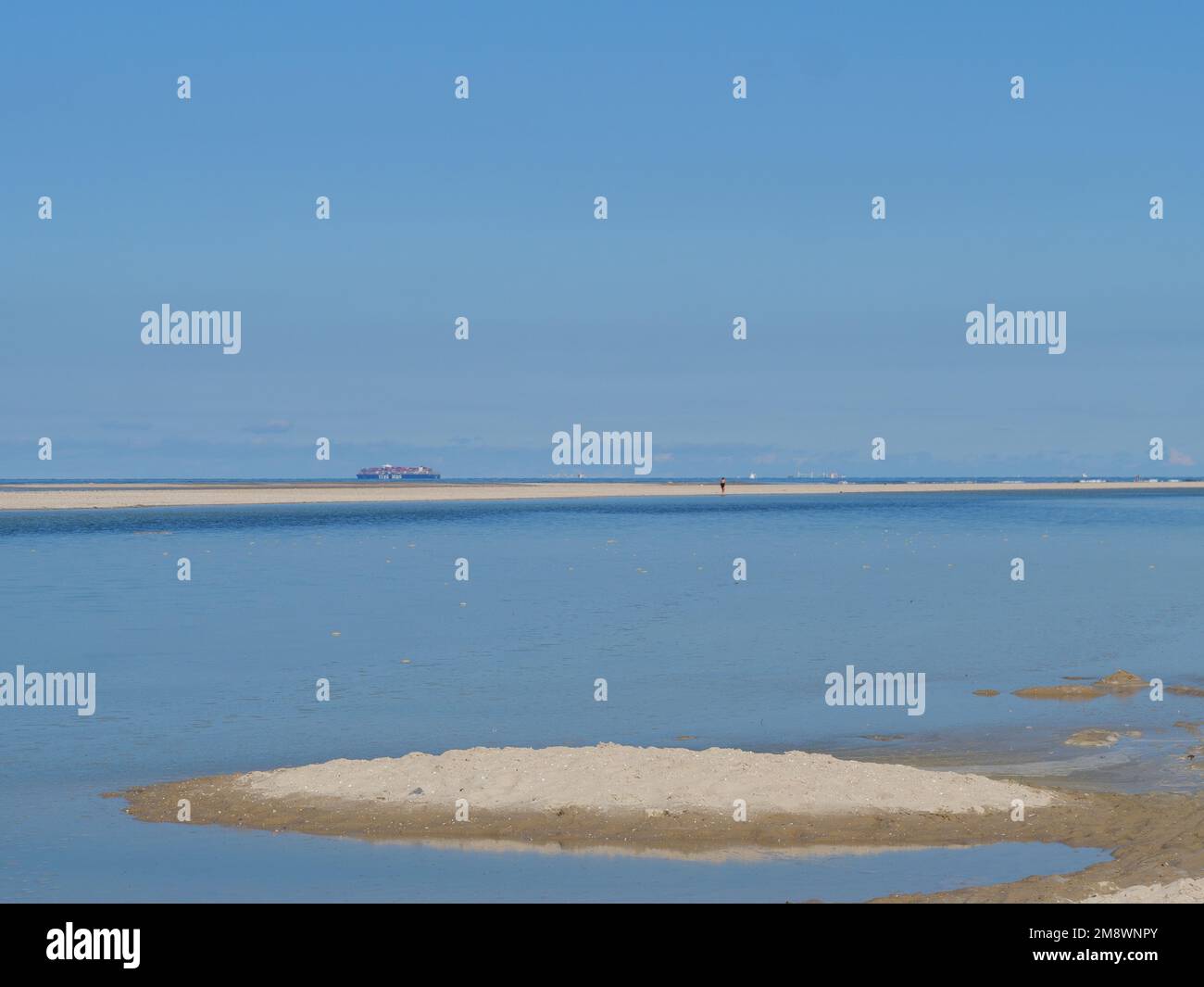 A beautiful seascape with blue sky in an island of Spiekeroog village in Germany Stock Photo