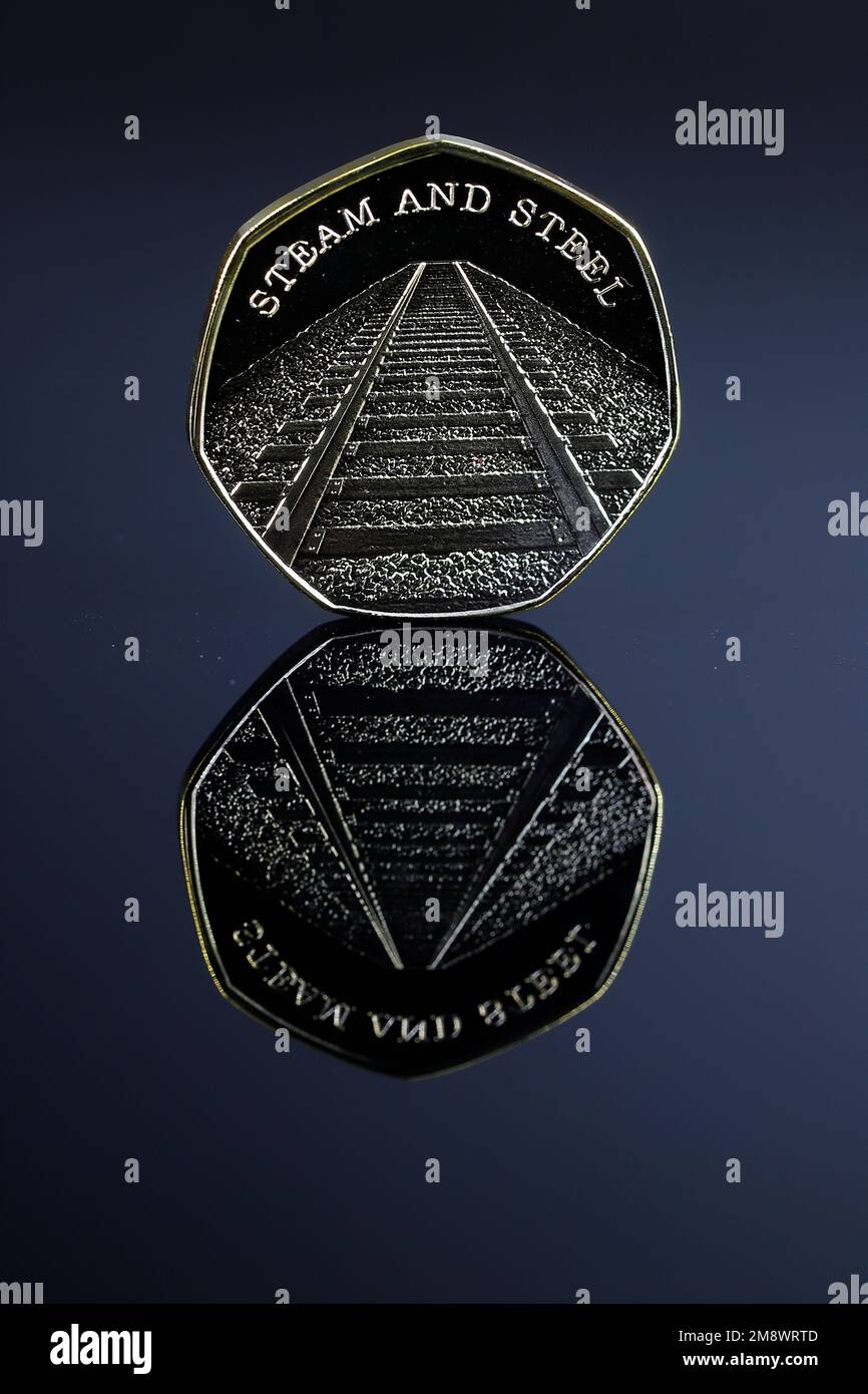 A Gold 50p coin featuring the Flying Scotsman which is not legal tender