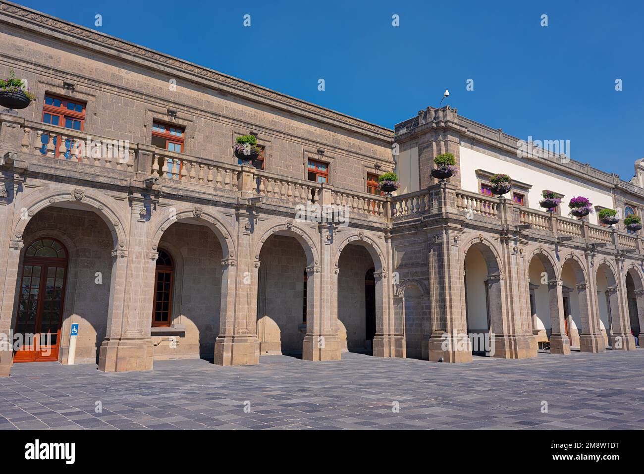 CDMX, CDMX, 11 12 22, Chapultepec castle main entrance with lavender flower arrangements on the second floor, on a cloudless day, no people Stock Photo
