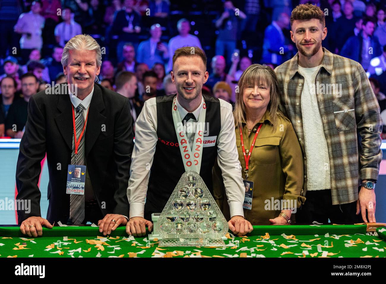 Judd Trump celebrates with his father Steve (left), mother Georgina and brother Jack (right