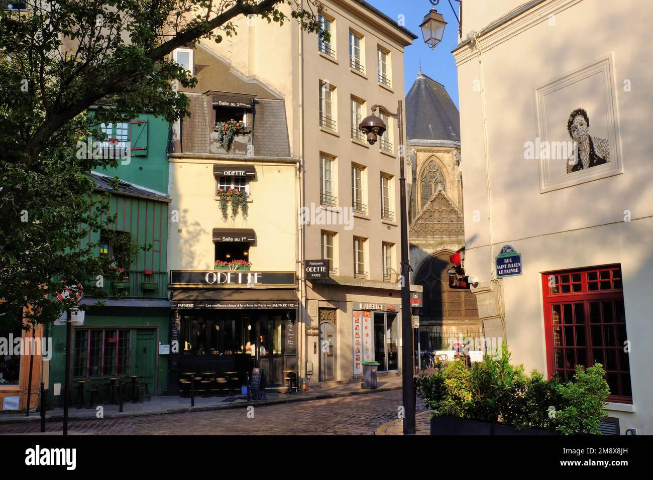 Paris: Rue Saint-Julien le Pauvre with quaint buildings and Odette restaurant in Rue Galande soon after sunrise in Latin Quarter, Rive Gauche, France Stock Photo
