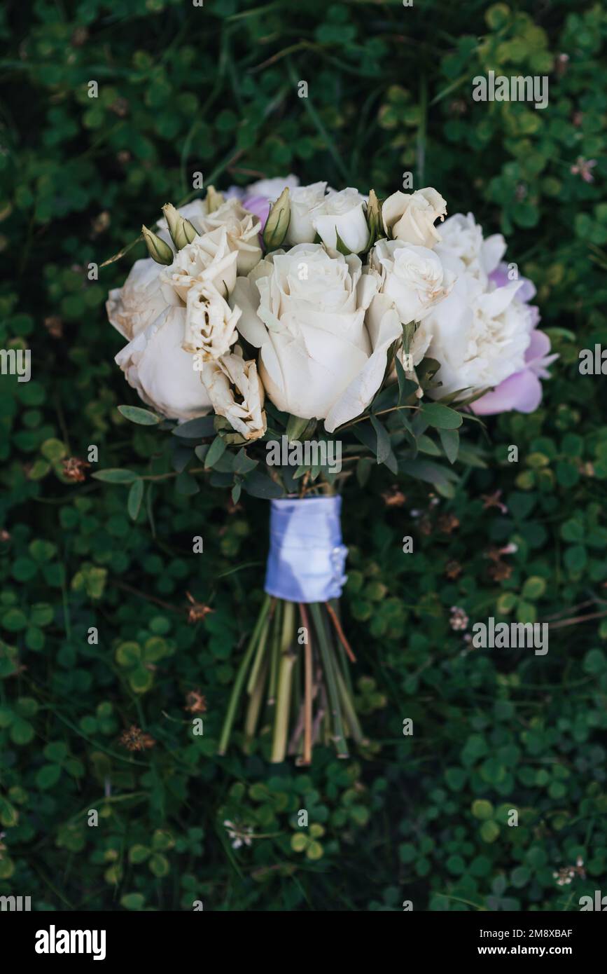 White wedding bouquet lying on hi-res stock photography and images - Alamy