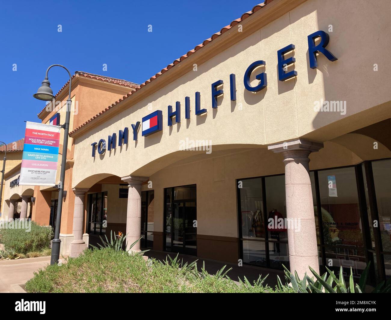 Tommy Hilfiger Sign and Logo at Premium Outlet in International Drive Area  . Editorial Photography - Image of concept, interior: 152776602