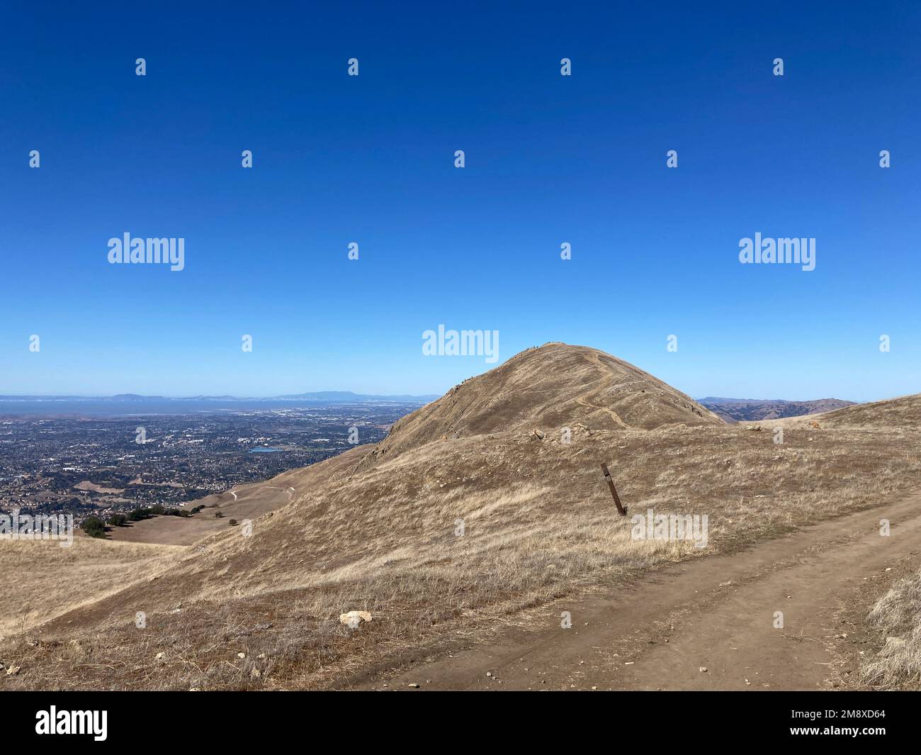 Aerial panoramic view of San Francisco Bay Area from hiking trail leading to MIssion Peak during fall season. Stock Photo