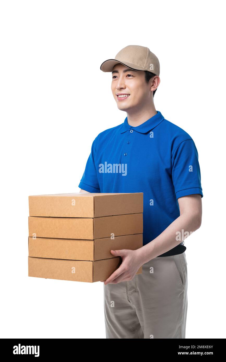 Smiling delivery man gestures hi-res stock photography and images - Alamy