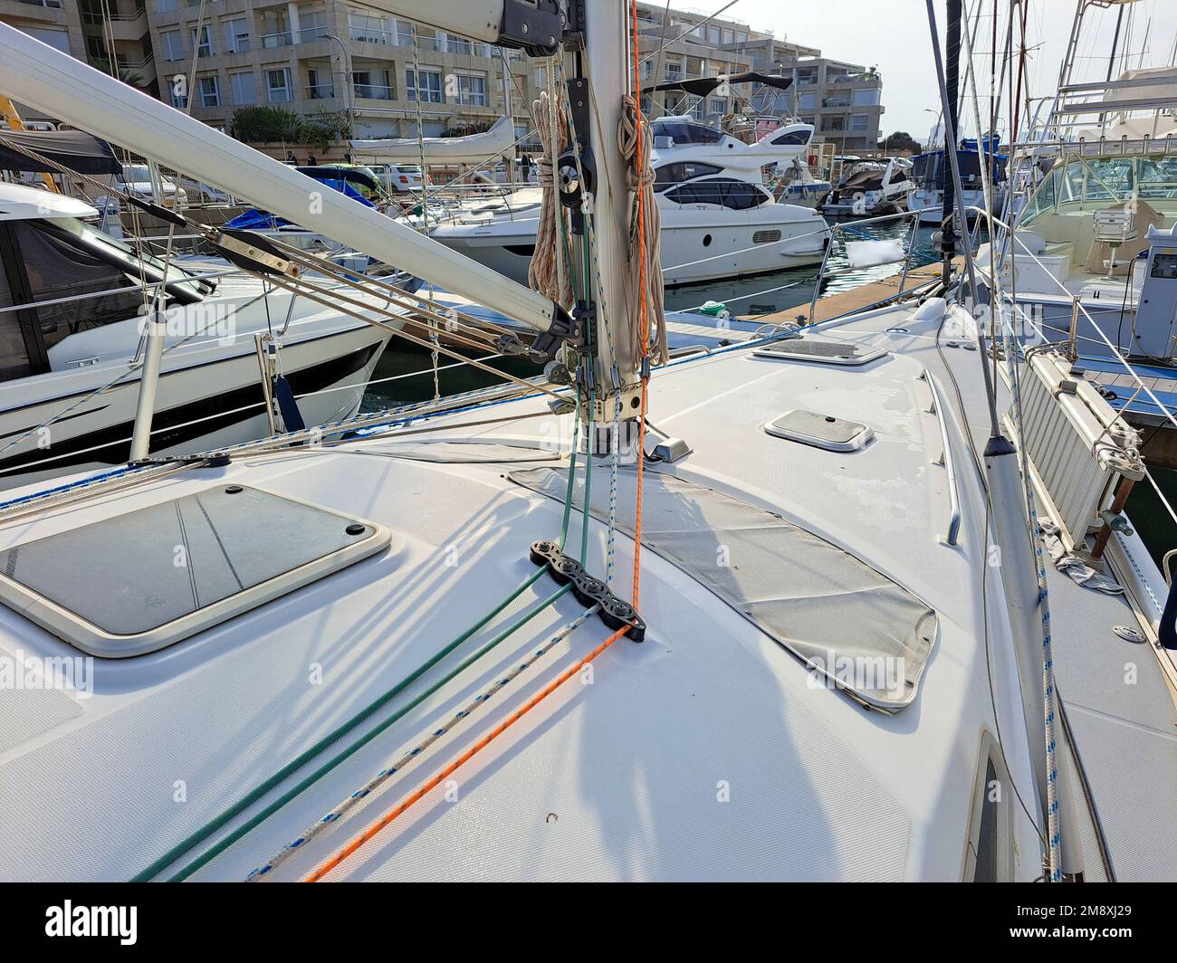Boats moored to dock Stock Photo - Alamy