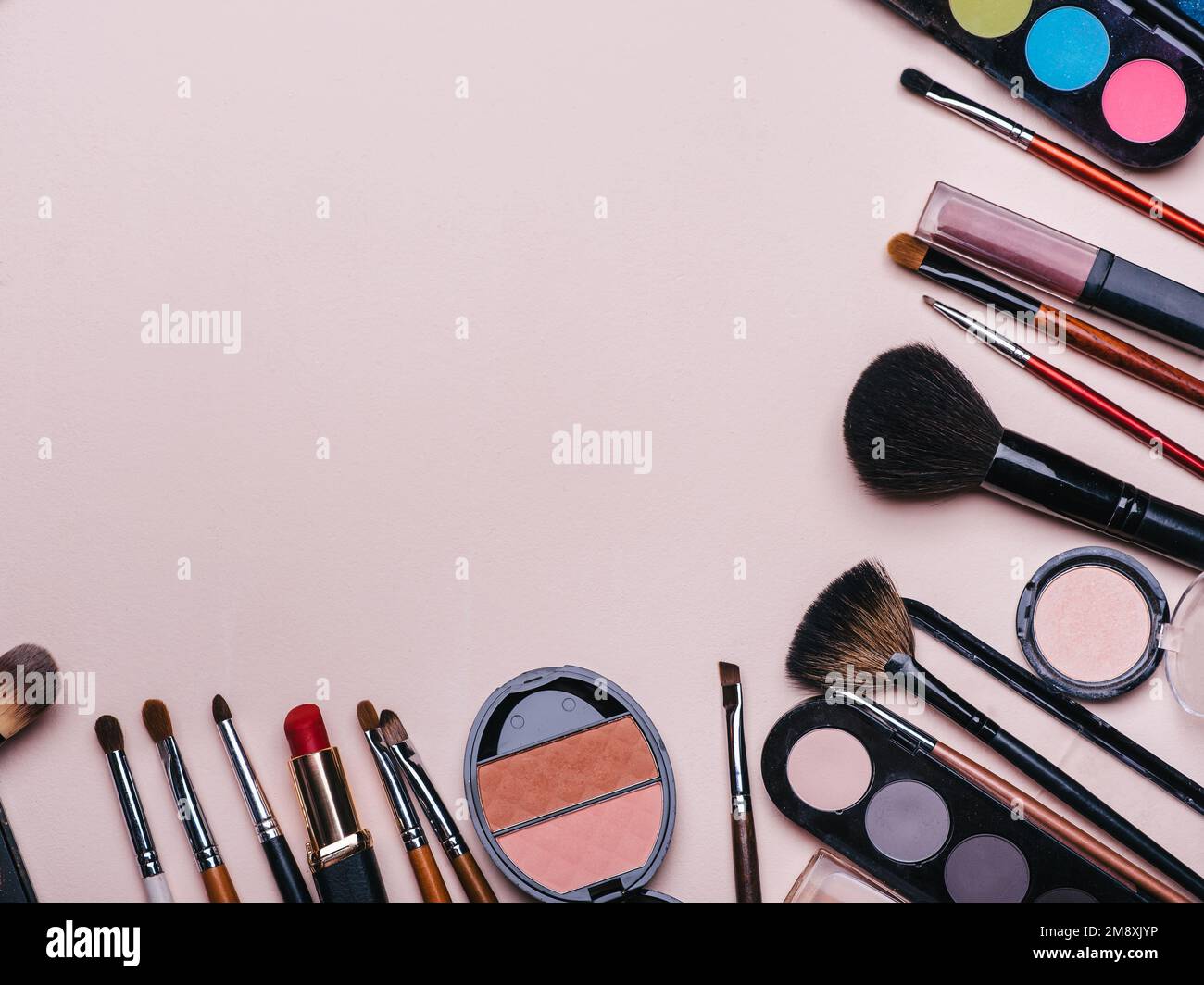 Set of professional cosmetics, makeup tools and accessories for women's beauty. Flat lay frame composition, top view. Stock Photo