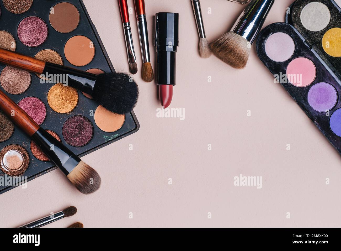 Set of professional cosmetics, makeup tools and accessories for women's beauty. Flat lay frame composition, top view. Stock Photo