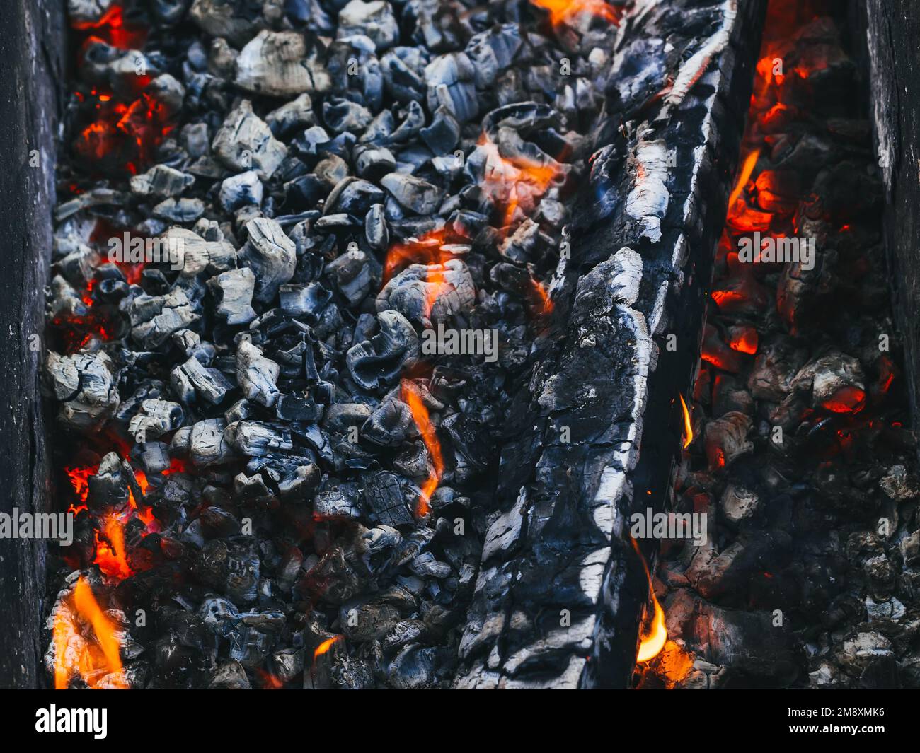burning wood and hot red coals in the fire closeup Stock Photo Alamy