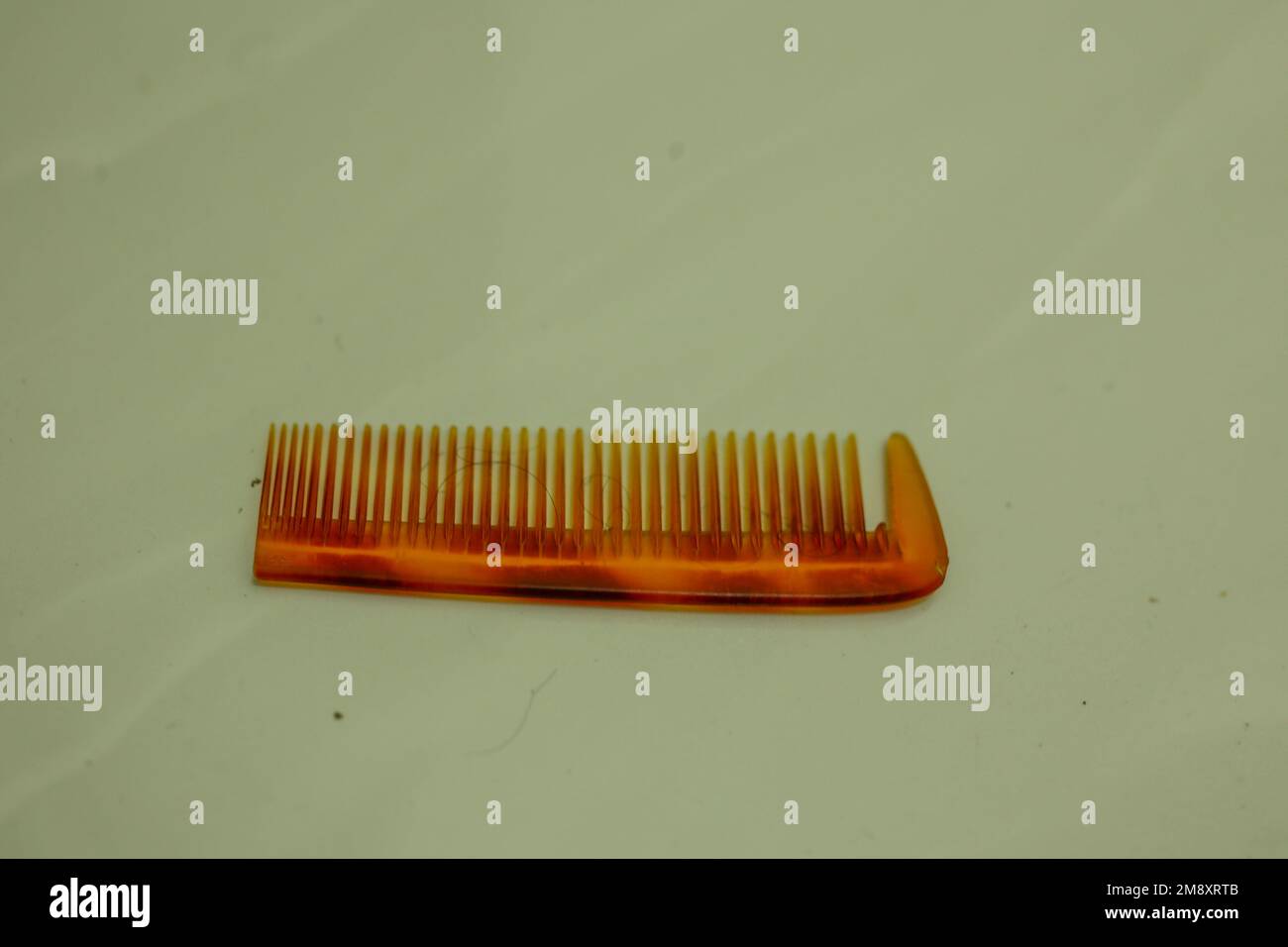 hair comb that has been broken and is still in use Stock Photo Alamy