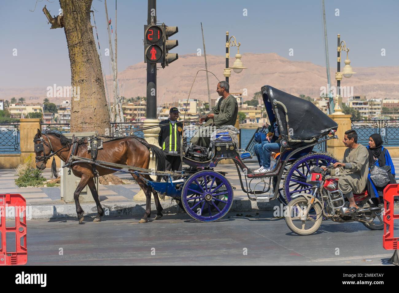 Horsedrawn carriage, tourists, Corniche waterfront, Luxor, Egypt Stock