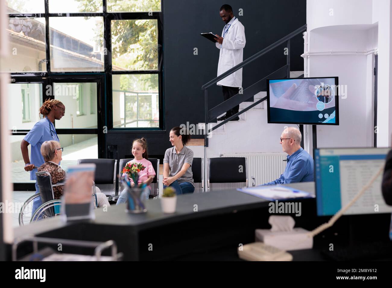 Practitioner nurse bringing elderly patient to family after finishing