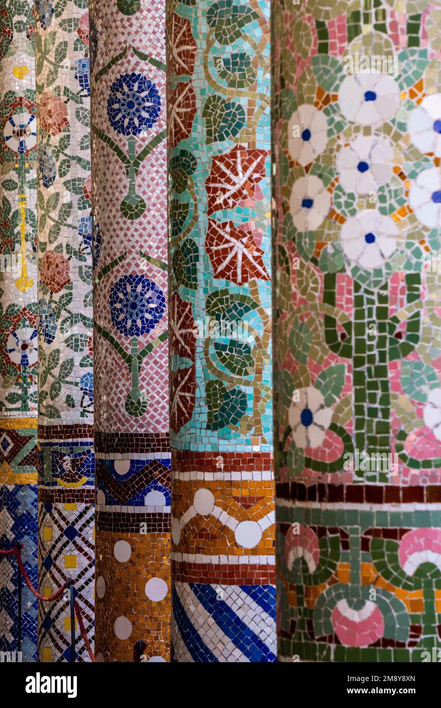 A vertical of columns covered with mosaic tiles Stock Photo - Alamy