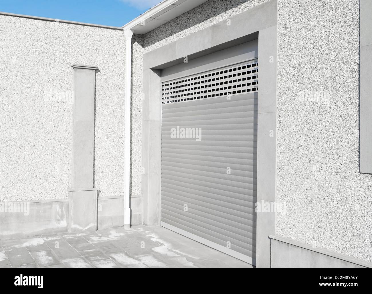 Roller shutter gate. Metal roller garage door as background. Automatic