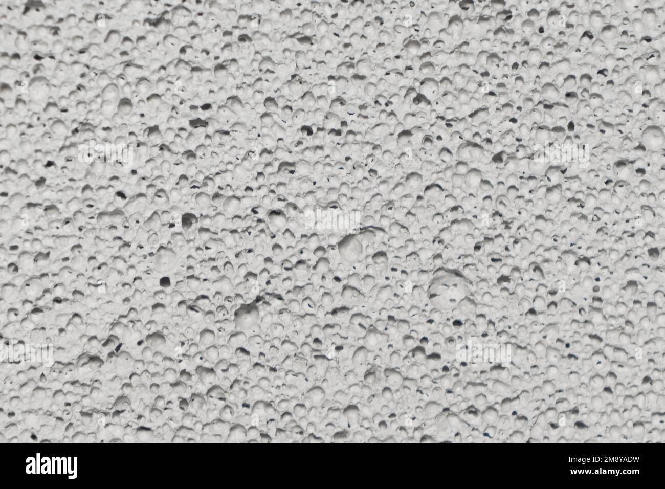 White pumice stone texture background. Macro shot. Closeup of natural