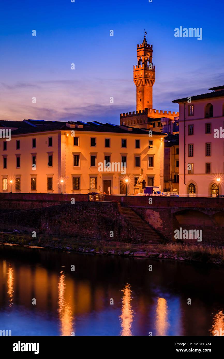 Sunset cityscape with the famous Palazzo Vecchio above the river Arno River in Centro Storico, Florence, Italy Stock Photo