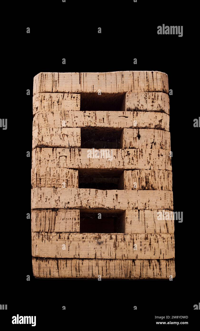 Stump stool made of cork also senton. Isolated over black Stock Photo