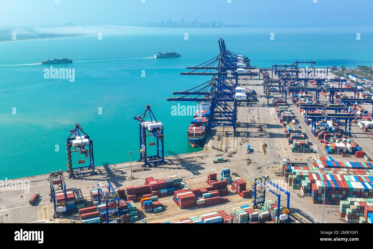Aerial photo shows the busy container terminal at Haikou Port in Haikou ...