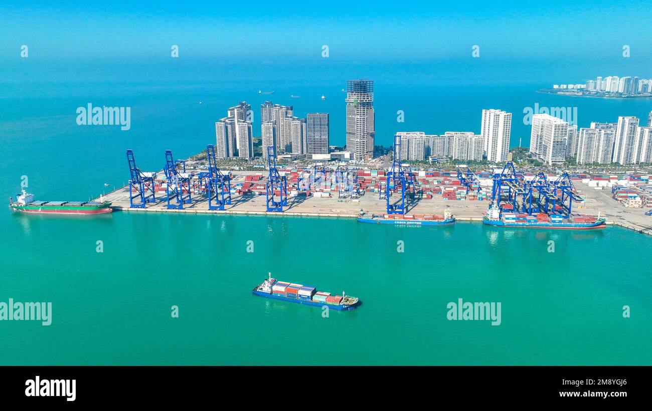 Aerial photo shows the busy container terminal at Haikou Port in Haikou ...
