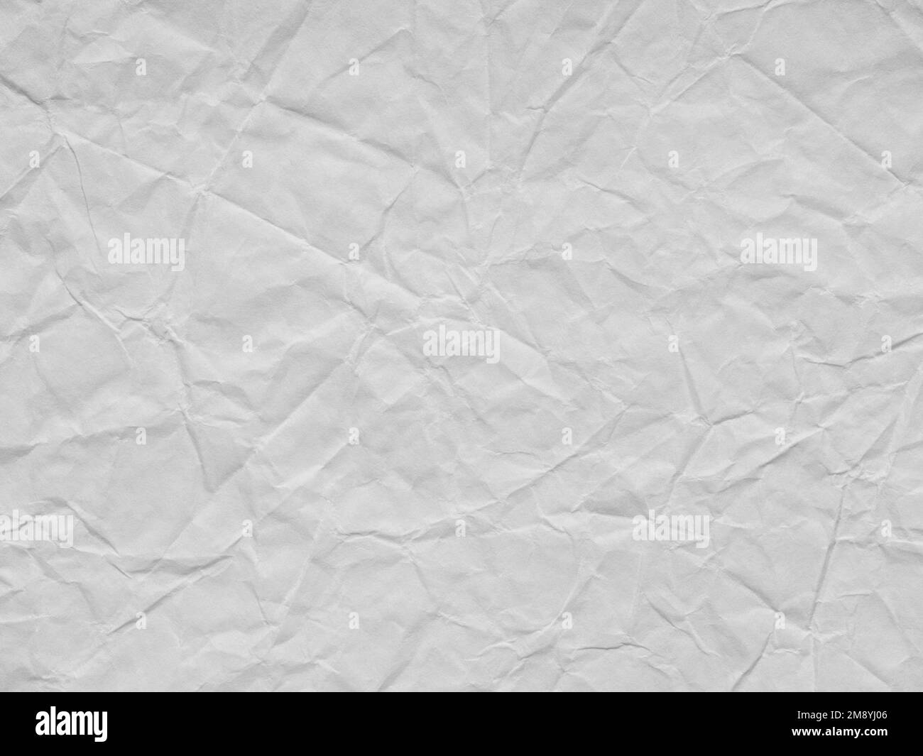 White crumpled paper texture. Background for handcrafts, new year designs decoration, text, lettering, wall screen saver. Page or sheet for interior Stock Photo